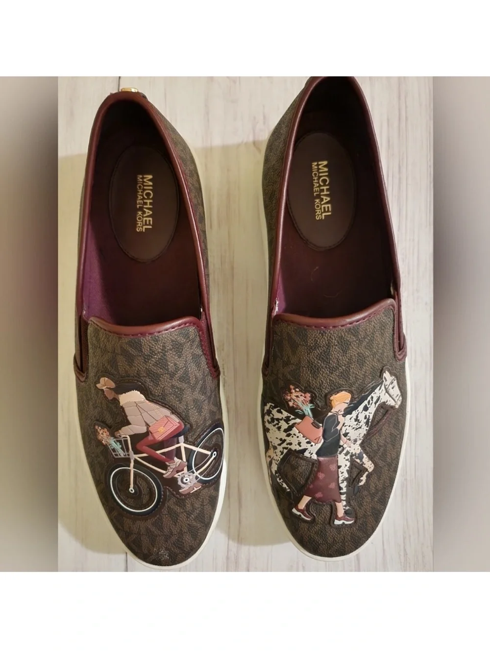 Michael Kors Brown Logo Slip-On Sneakers with Maroon Trim and Illustrated Motifs